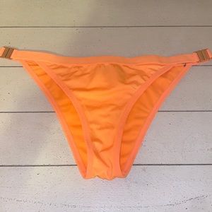 L.A. Hearts neon orange swim bottoms. Size L
